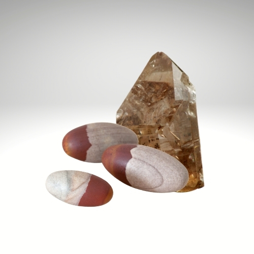 Smokey Quartz is usually brownish and Shiva Lingham is also brown and cream
